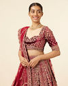 alt message - Mohey Women Maroon Embellished Bridal Lehenga image number 1